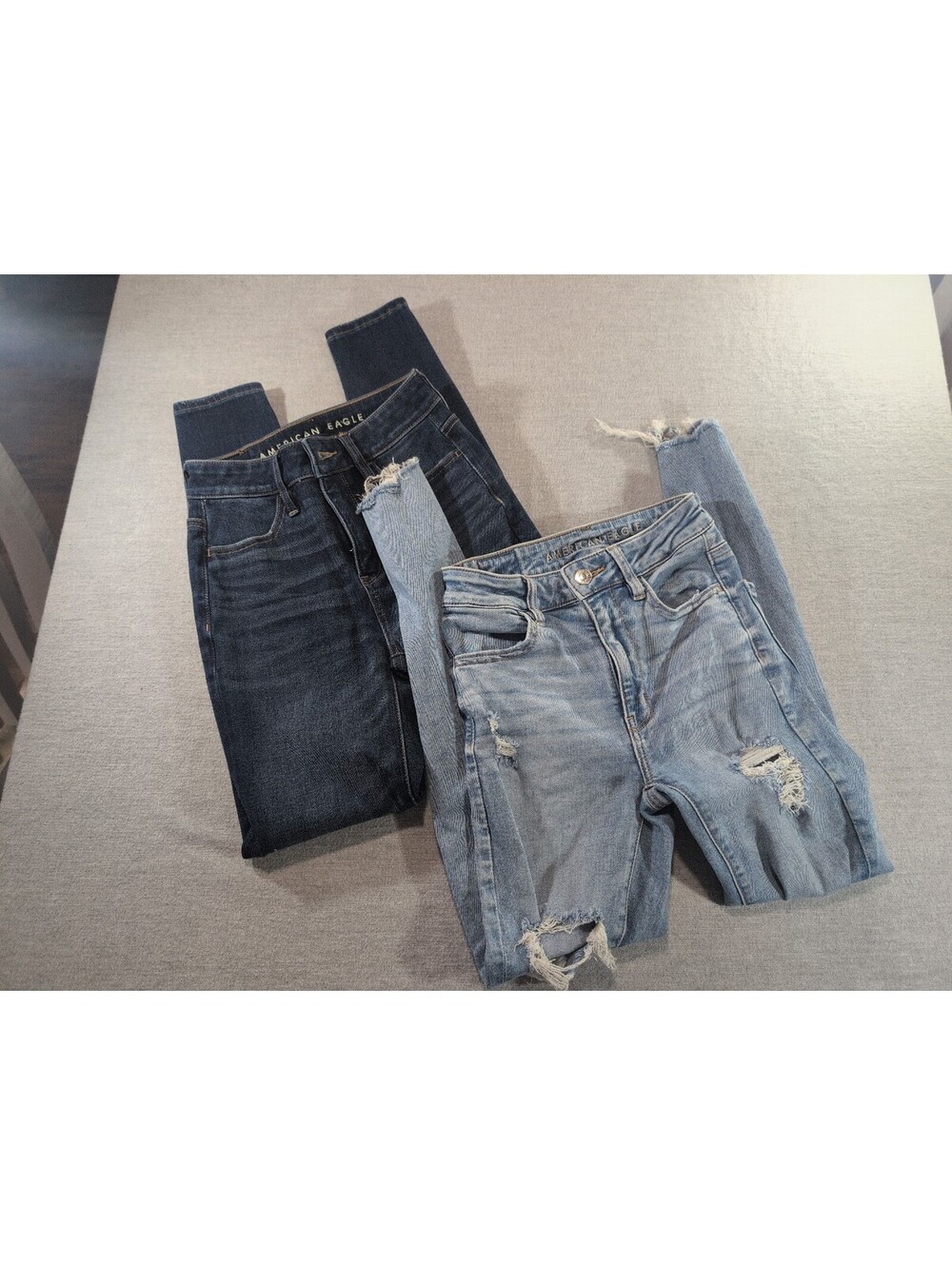 Two Pair American Eagle super hi rise Jegging size 00 short